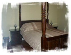 Bedroom with four-poster bed